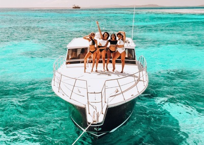 a group of women on a boat